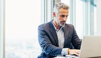 man working on laptop