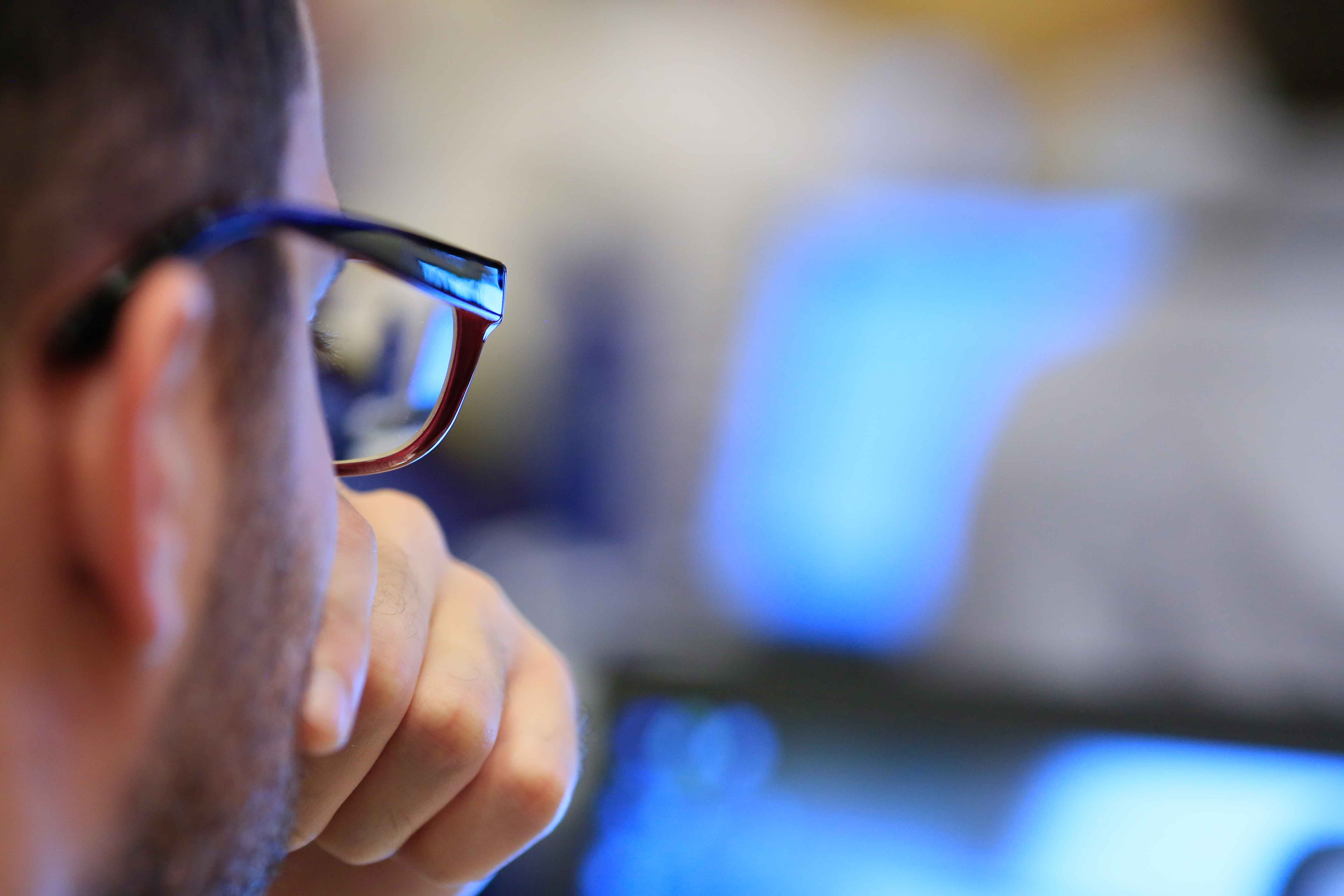 man looking at a screen