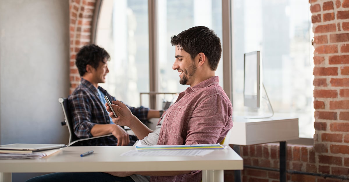 two people working in an office together