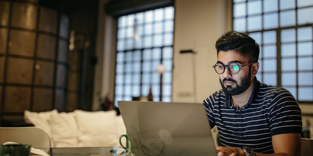 man working on a laptop