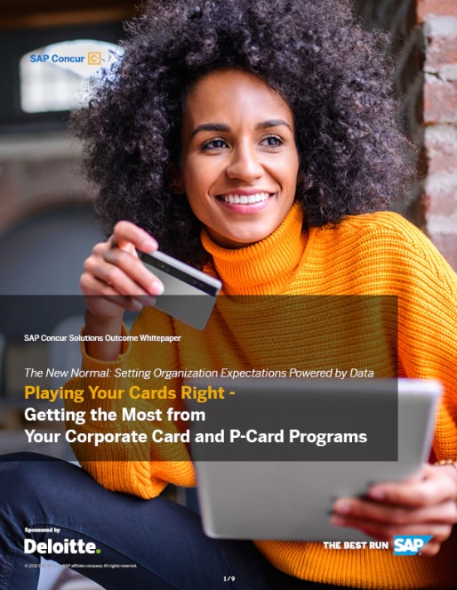 woman with a tablet and credit card in her hands