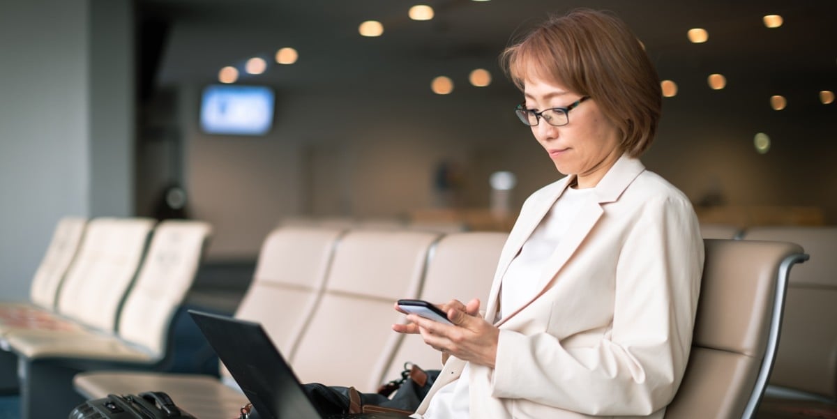 Asian women using mobile phone