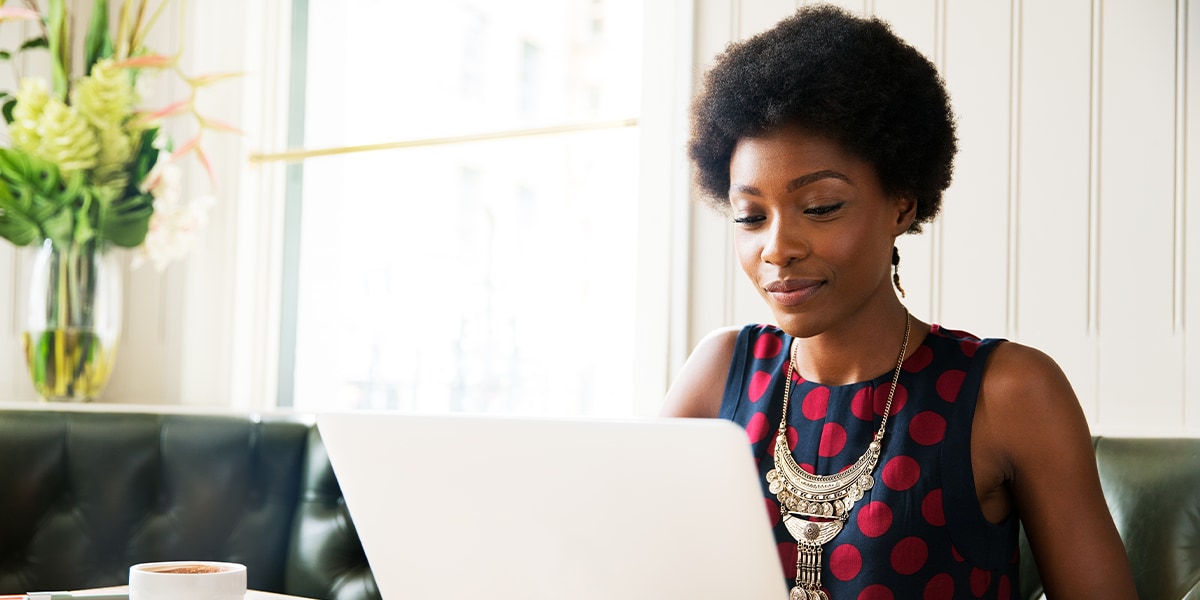 a business woman sitting at the desk