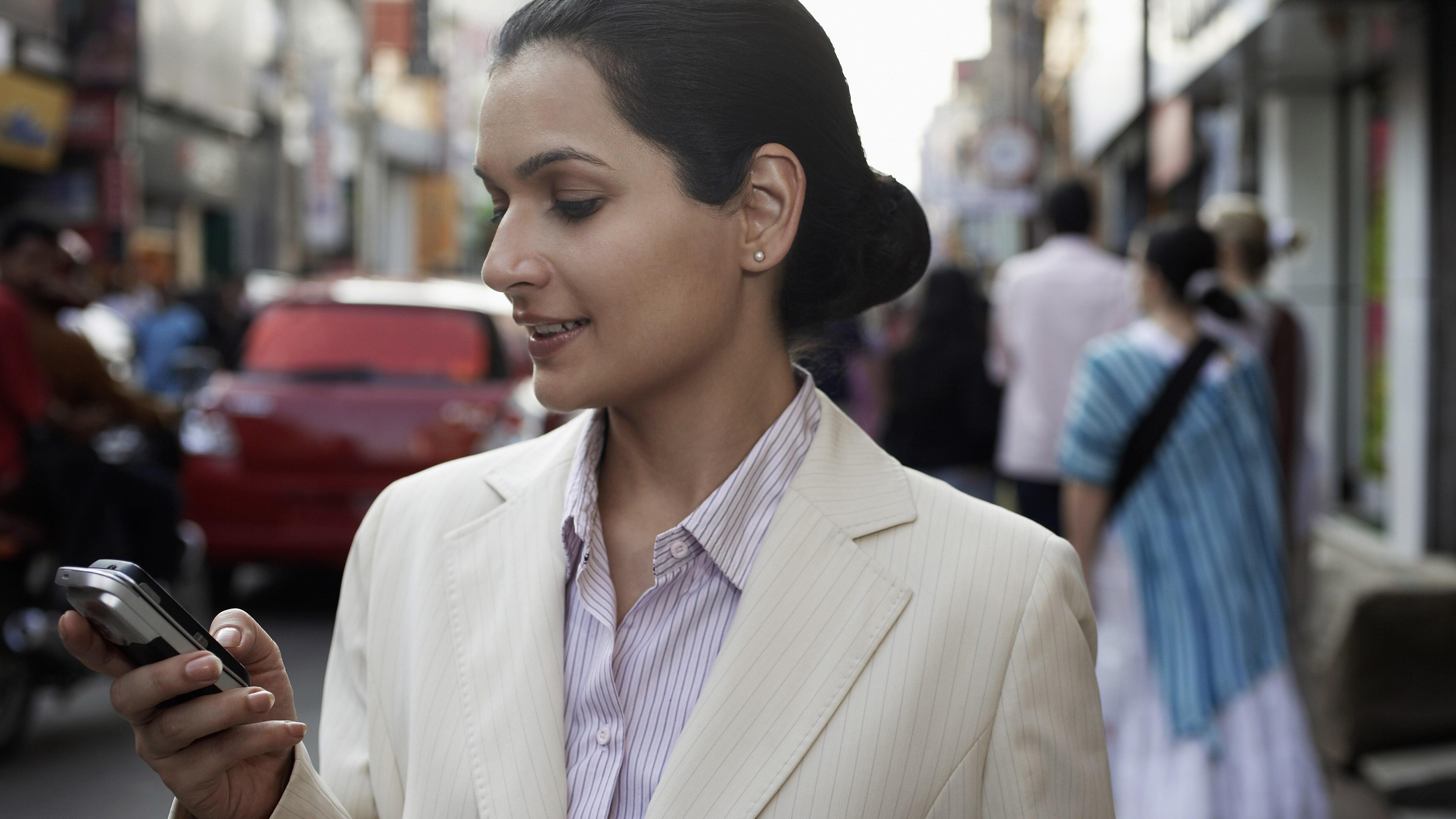 woman looking at phone